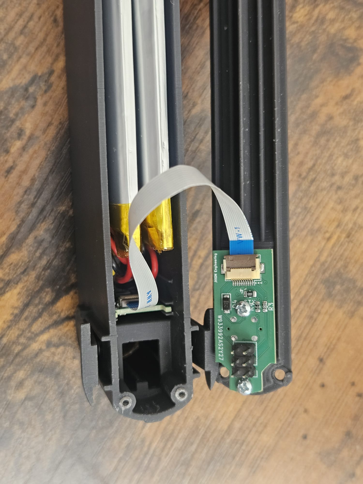 The flat flex arcing between the two halves of the housing during assembly